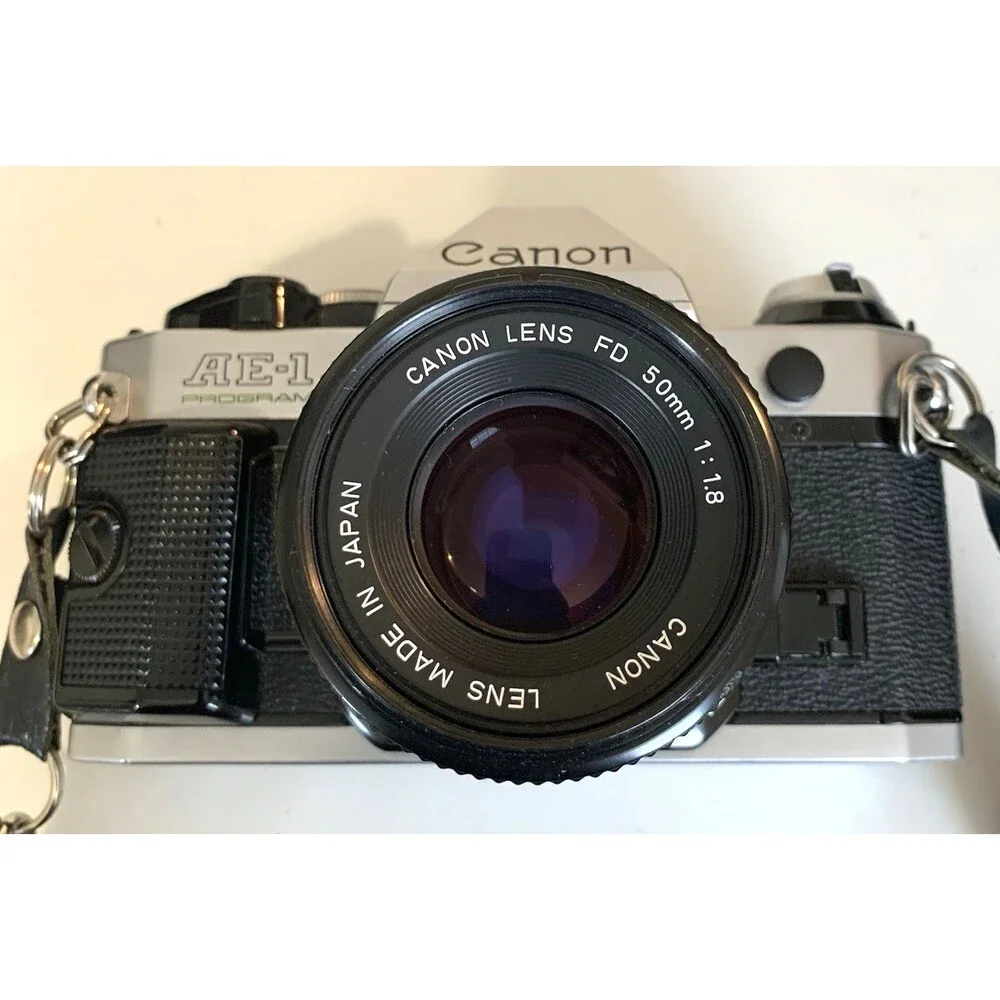 Canon AE-1 Program SLR 35mm Film Camera w/ 50mm F/1.8 Lens & Camera Bag & More